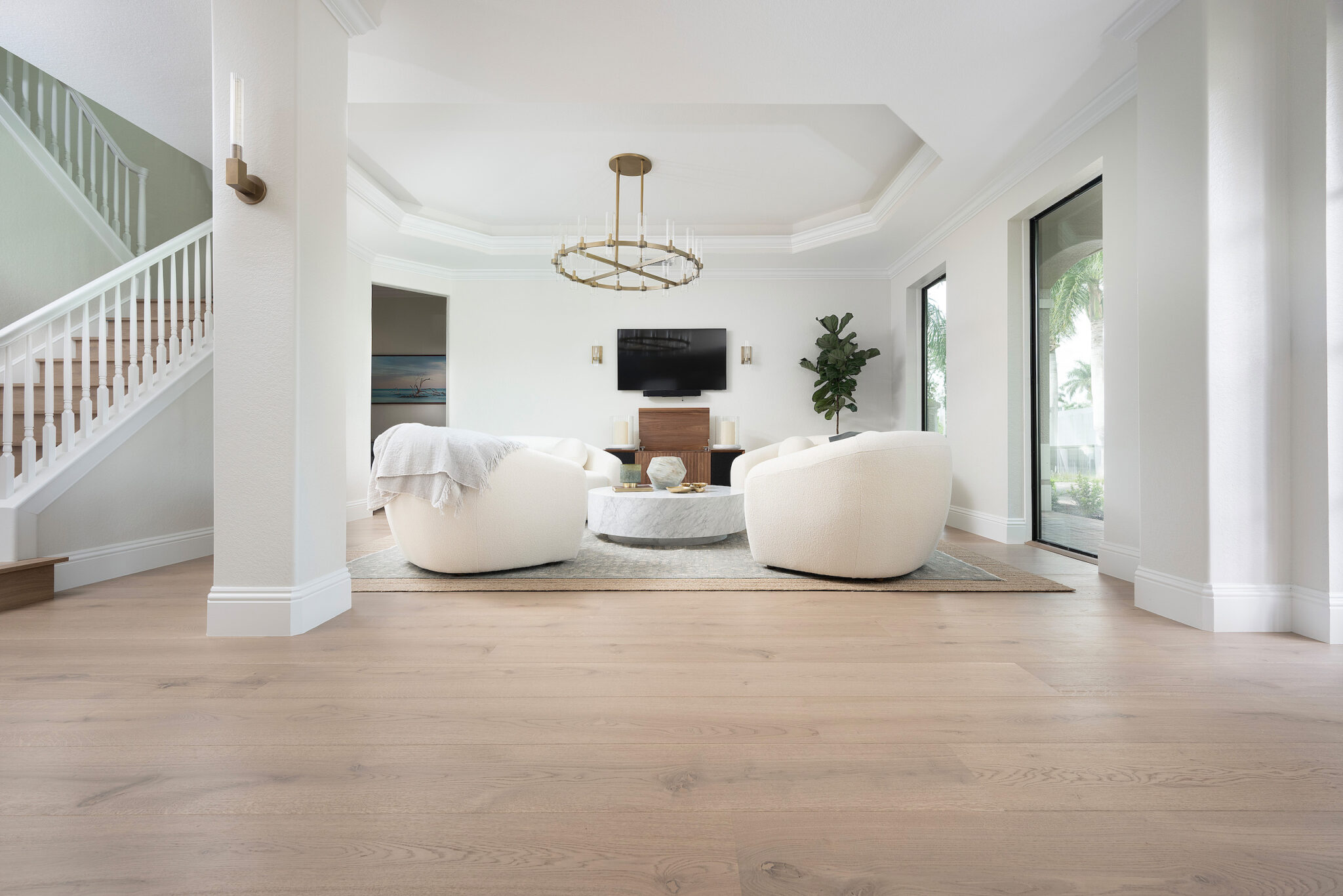 white-colored-living-room-with-wide-engineered-hardwood-floors
